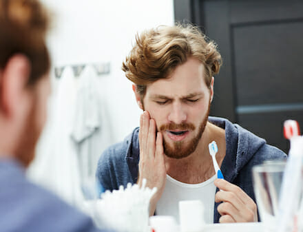 man with tooth pain